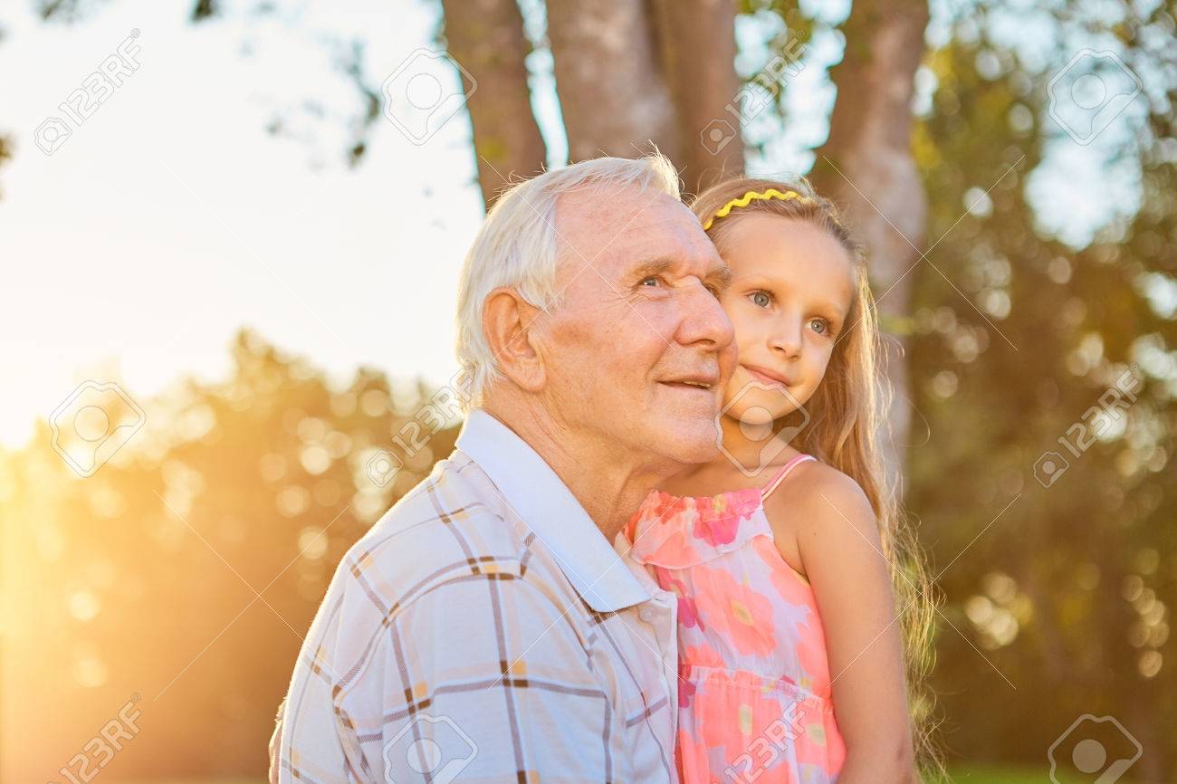 Senior man with his granddaughter.